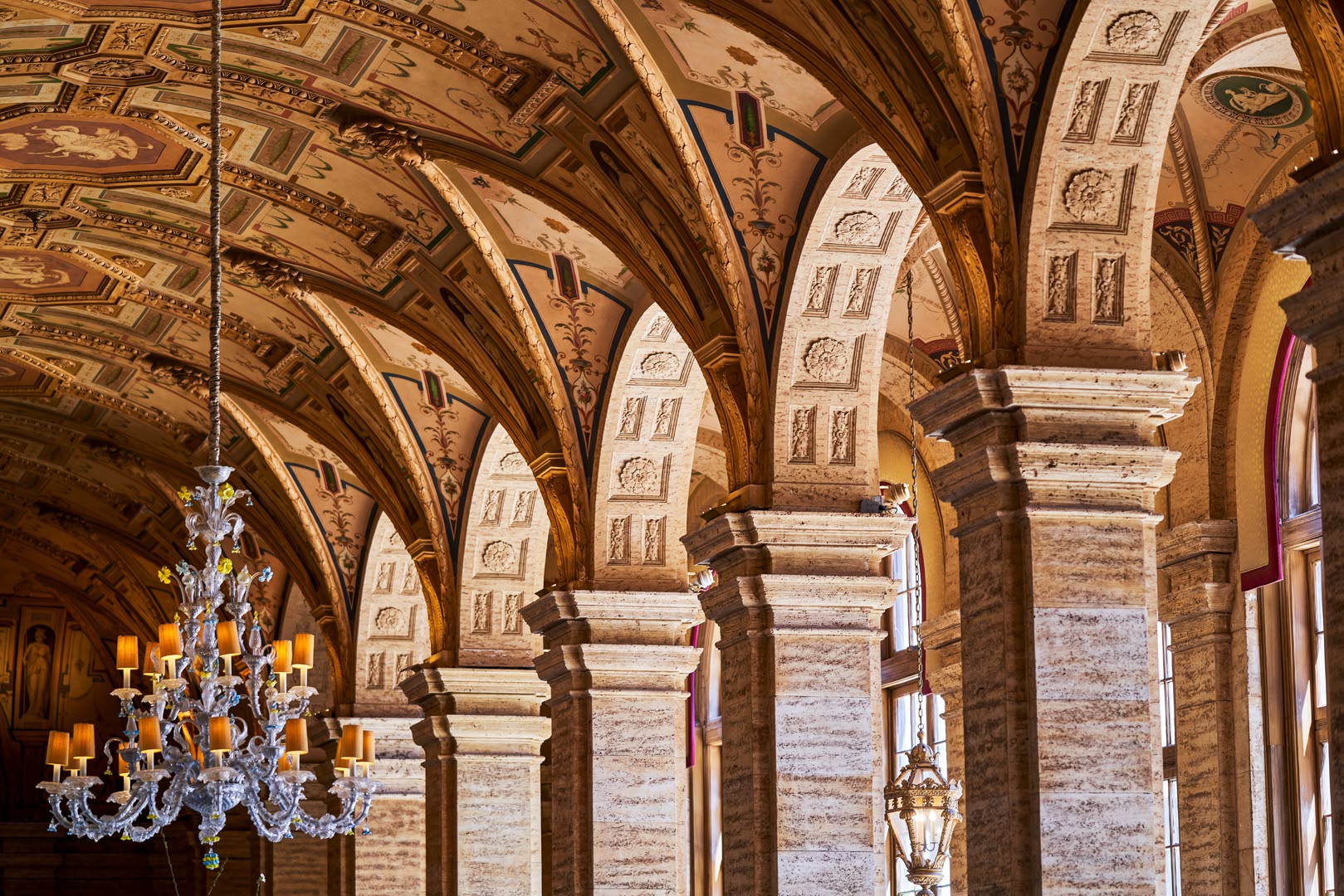 Ornate vaulted archways and chandeliers of a historic Florida hotel